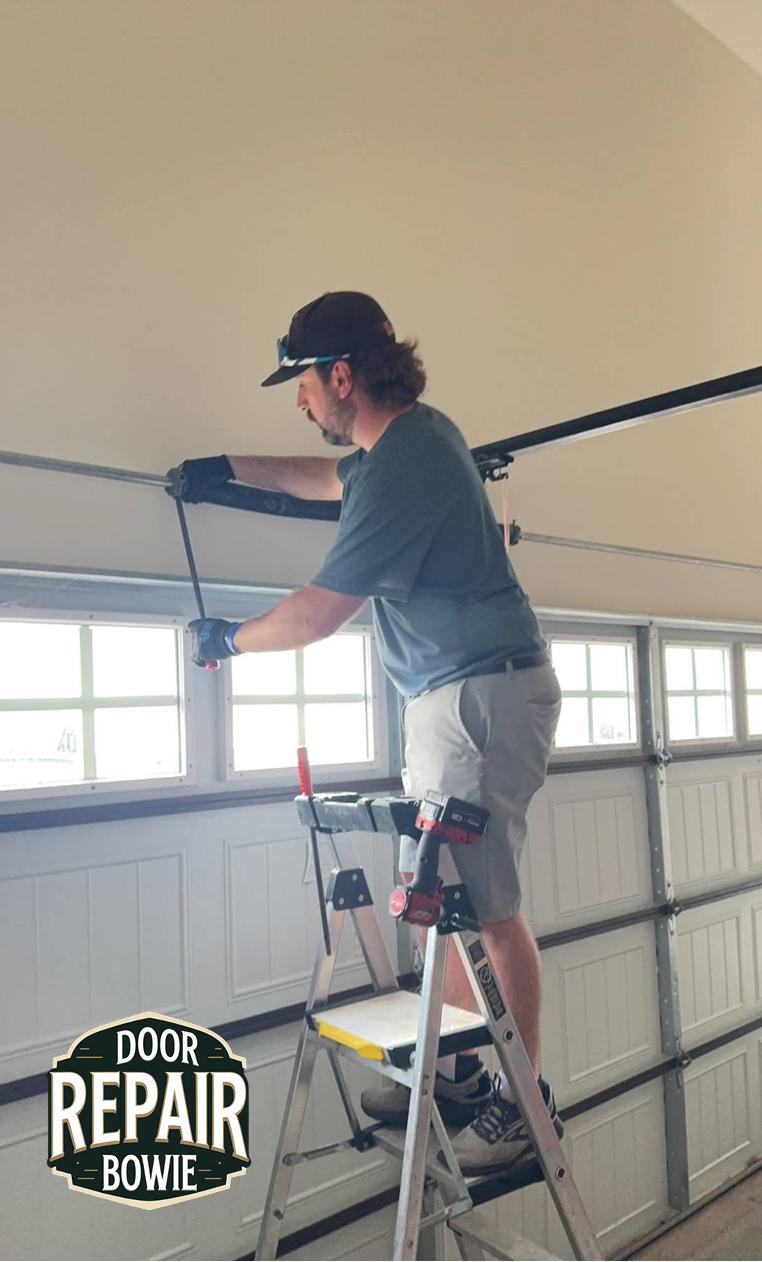 Track realignment and roller replacement